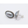 A Gorgeous Pair of Oval Shell Earrings in Sterling Silver