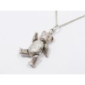 A Lovely Articulated Teddy Bear Pendant On  chain in Sterling Silver