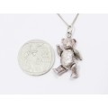 A Lovely Articulated Teddy Bear Pendant On  chain in Sterling Silver
