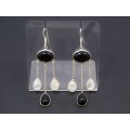 A Stunning Pair of Moonstone and Obsidian Stone Dangling Earrings in Sterling Silver.