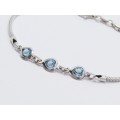 A Lovely Blue Heart Design  Zirconia Bracelet in Sterling Silver.