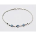 A Lovely Blue Heart Design  Zirconia Bracelet in Sterling Silver.