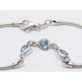 A Lovely Blue Heart Design  Zirconia Bracelet in Sterling Silver.