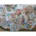 1000 X WORLD USED STAMPS ON PAPER SEE PICS!!!