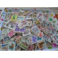 800 X WORLD USED STAMPS ON PAPER VERY NEAT LOT SEE PICS
