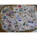 700 X MIXED WORLD STAMPS USEDON PAPER GREAT LOT GOOD VALUE SEE PICS