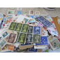 800 X WORLD USED STAMPS ON PAPER VERY NEAT LOT SEE PICS