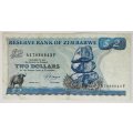 1983 | 2 Dollars | Zimbabwe | 134 x 69 mm | "Chiremba Rocks" Issue | Signature: 2