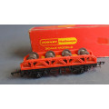 HORNBY OO SCALE - FLAT CAR WITH WHEEL LOAD - BOXED