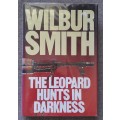 The Leopard hunts in darkness - Wilbur Smith Hardcover 1984 first edition in excellent condition