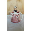 A lady Staffordshire teapot