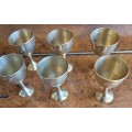Miniature arty solid brass decanter and six small goblets. on its own tray Very beautifully crafted