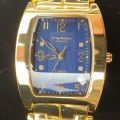 RETAIL: R10,314.58 Krug-Baumen LADIES Tuxedo Gold  4X Genuine Diamond Blue Dial Gold Strap Watch