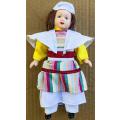Porcelain Doll in Colourful Dress