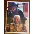 Nelson Mandela & Miriam Makeba laminated photo, signed by President Nelson Mandela (with COA)