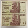 $200 Million Dollars Zimbabwe Bank Notes, 2008 Harare. Two UNC AA Series notes In Sequence