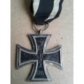 The second Iron Cross with the date of 1813 has FW for Kaiser Friedrich Wilhelm III of Prussia who i