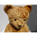 Retro, large (700mm high), straw-filled teddy bear with a small modern friend.