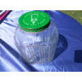 Ribbed glass storage jar.
