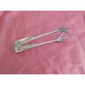 Silver-plated ice tongs.