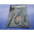 `The World of Elephants`  Soft cover.