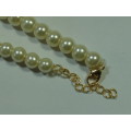Vintage pearl bead Necklace with gold tone Pendant and red stone
