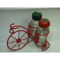 Spice shakers on a Bicycle stand, vintage