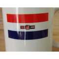 Old South African flag on a coffee mug