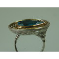 Chunky and heavy silver and Gilded Ring set with blue stone, 10.1grams