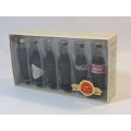 1999 Boxed set of 6 Coca Cola miniature glass Bottles.Evolution of the contour bottle 1899-1999 mint