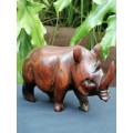 Small carved wooden Rhino