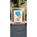 Egyptian portrait on papyrus between glass in frame