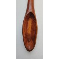 Hand carved rustic wooden spoon
