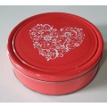 Red tin with hart image as per photos