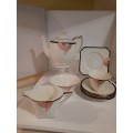 ROYAL DOULTON CUPS AND SAUCERS