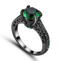 Bewitching 10KT Black Gold Filled Ring With Simulated Emeralds Size 6 US