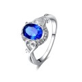 STUNNING!! Ring With 16 Simulated Diamonds And Blue Sapphire Size 6 US