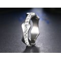 RETAIL PRICE: R 1 299 Titanium Ring With Simulated Diamonds Size 7 US SILVER