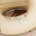 RETAIL PRICE: R 999 Adjustable Titanium Whimsical Feather Bracelet (GOLD OR SILVER)