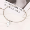 RETAIL PRICE: R 999 Adjustable Titanium "Whimsical Feather" Charm Bangle (SILVER)