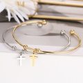 RETAIL PRICE: R 999 Adjustable Titanium "Cross" Charm Bangle (GOLD )