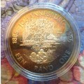 RSA Proof 1986 Johannesburg Centenary Silver One Rand in capsule