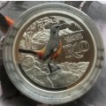 Lovely low mintage Colourised SA Mint Proof 2016 Silver R10 - Cape Rockjumper