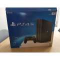 Playstation 4 pro (Ps4 pro) with 5 games.