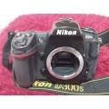 Nikon D300s plus Nikon 28-80mm lens, and various other camera equipment and gadgets as a free extra.