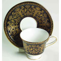 * MAGNIFICENT WEDGWOOD CAERNARVON TEA CUP AND SAUCER : GOLD ON BLACK  BACKGROUND (PRINCE CHARLES)