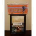 A Holland Plaque (Metal) and an Amsterdam Picture in Frame