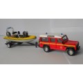 Land Rover 110 Defender with boat - Police - 1:43 Burago