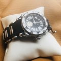 Retail: R18,000.00 Aquaswiss Women's Swissport w/ 12 Diamonds and Black Silicone Watch OFFICIAL