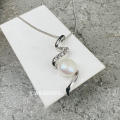 BRITISH JEWELLERS Devition Freshwater Pearl Bow Pendant with Swarovski Elements® + Chain